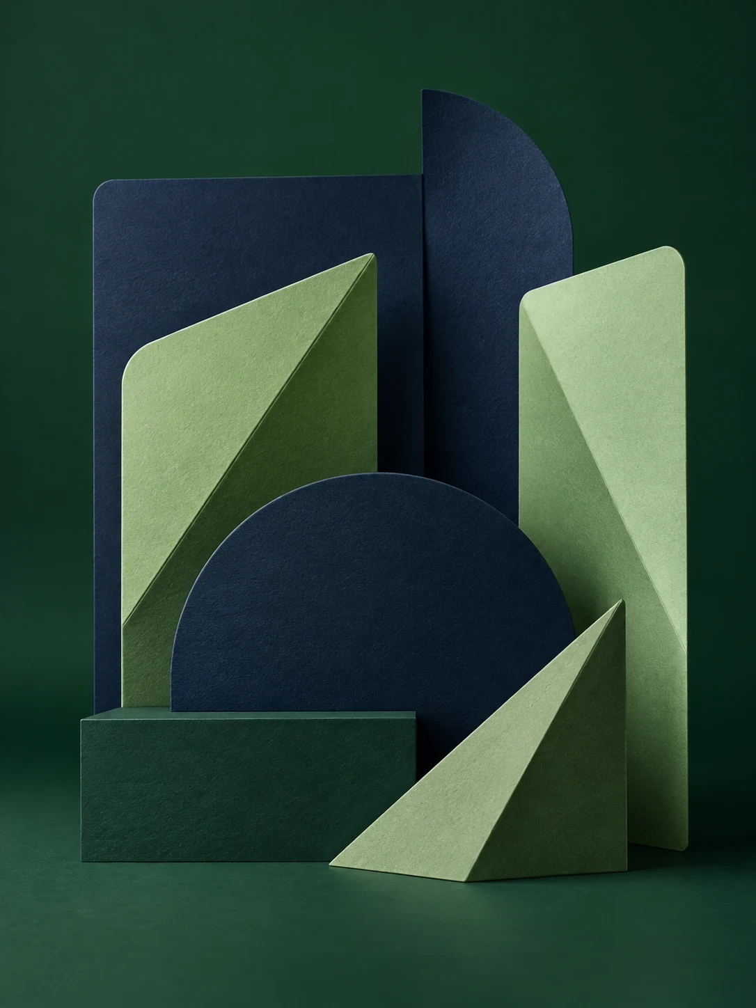 Layered green and navy forms symbolising carefully structured capital